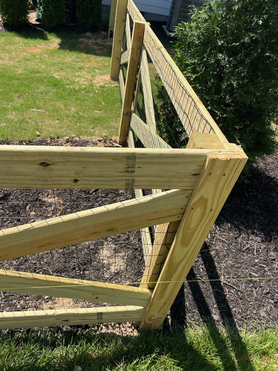 4ft high wooden cross buck farm fence install