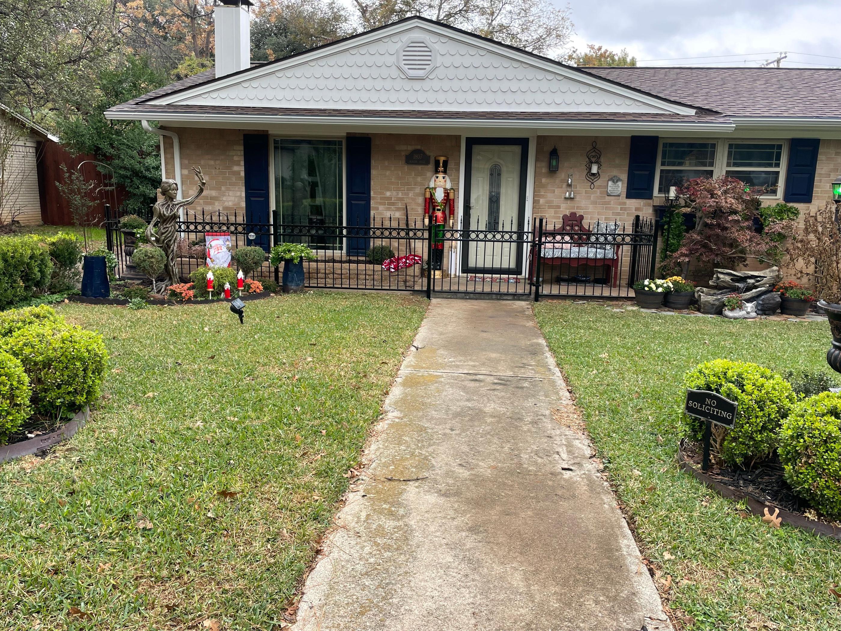 iron fence installed by top rail fence