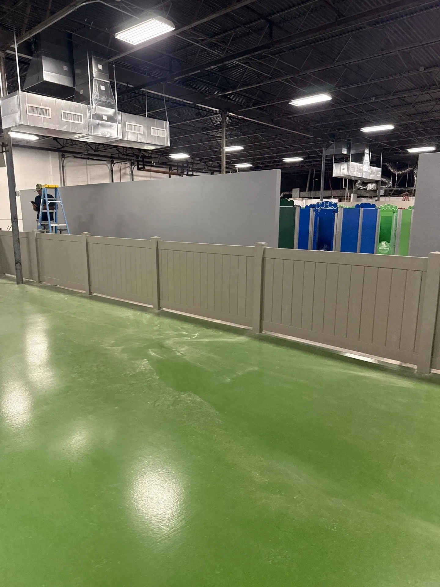 commercial fence installed by top rail fence