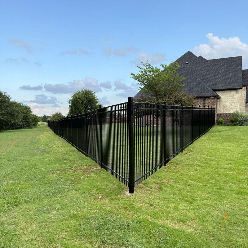 metal fence installed by top rail fence