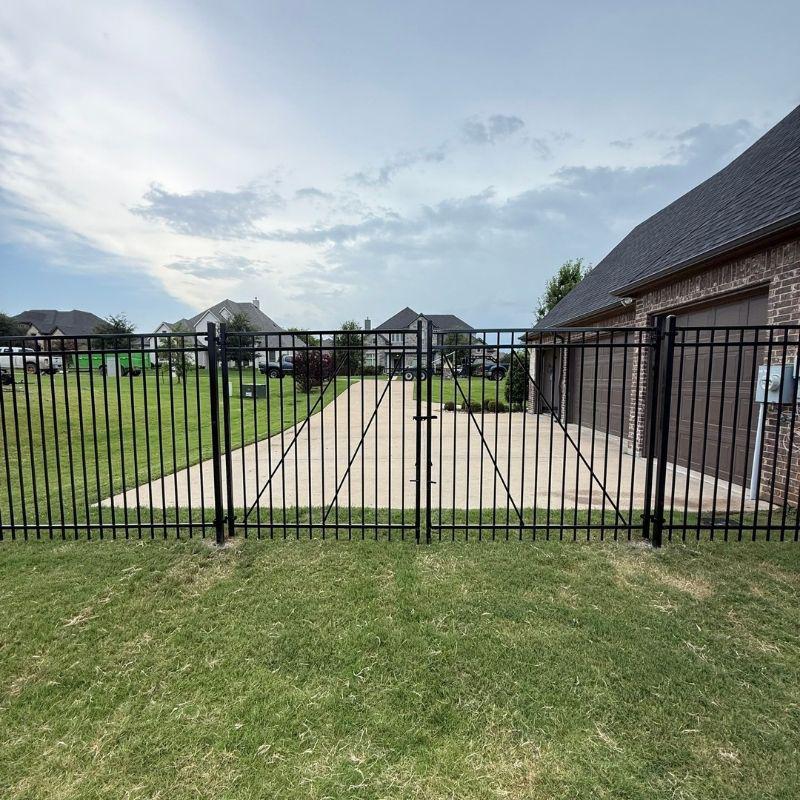 metal fence installed by top rail fence