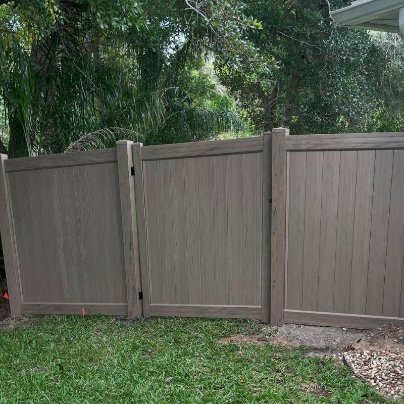 vinyl fence installed by top rail fence