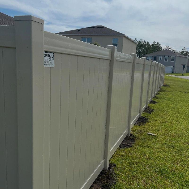 Tan Vinyl Fence Installation