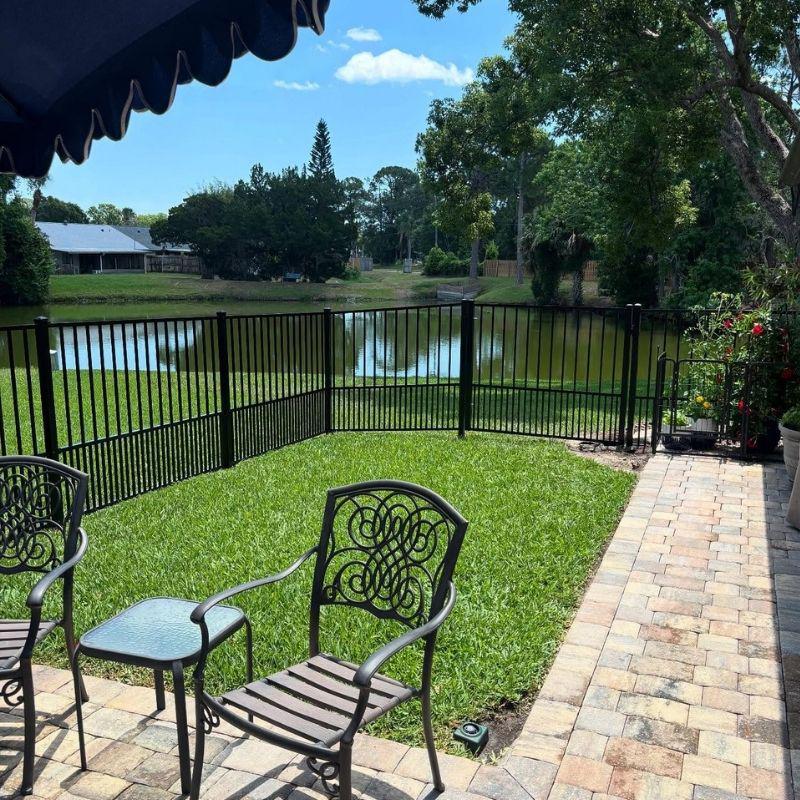aluminum fence installed by top rail fence