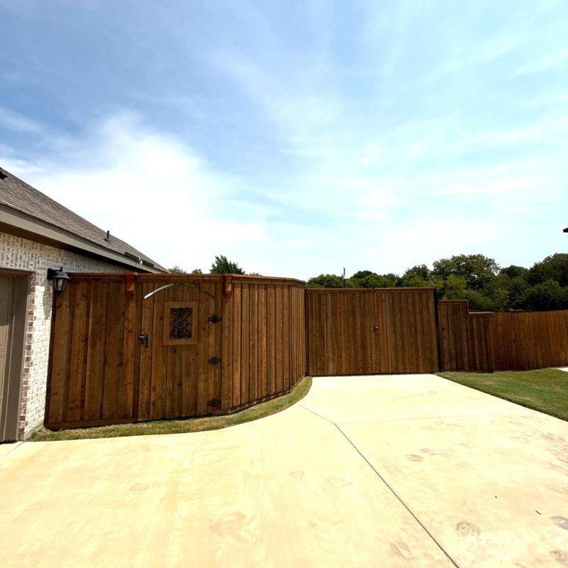 Custom 8’–6’ Cedar Fence with Steel Posts and Oxford Brown Finish