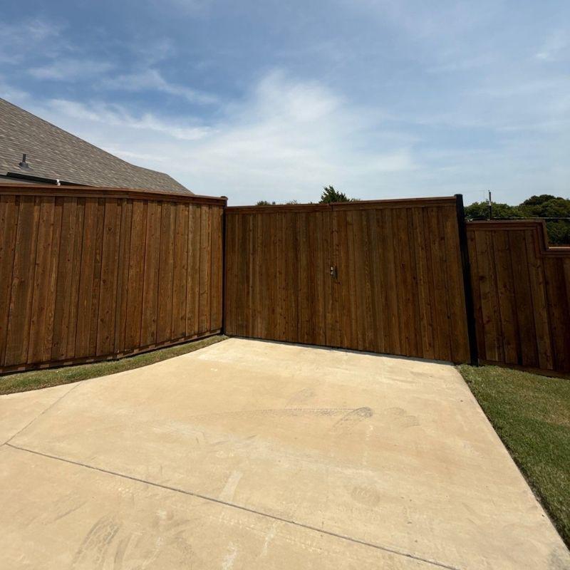 wood fence installed by top rail fence