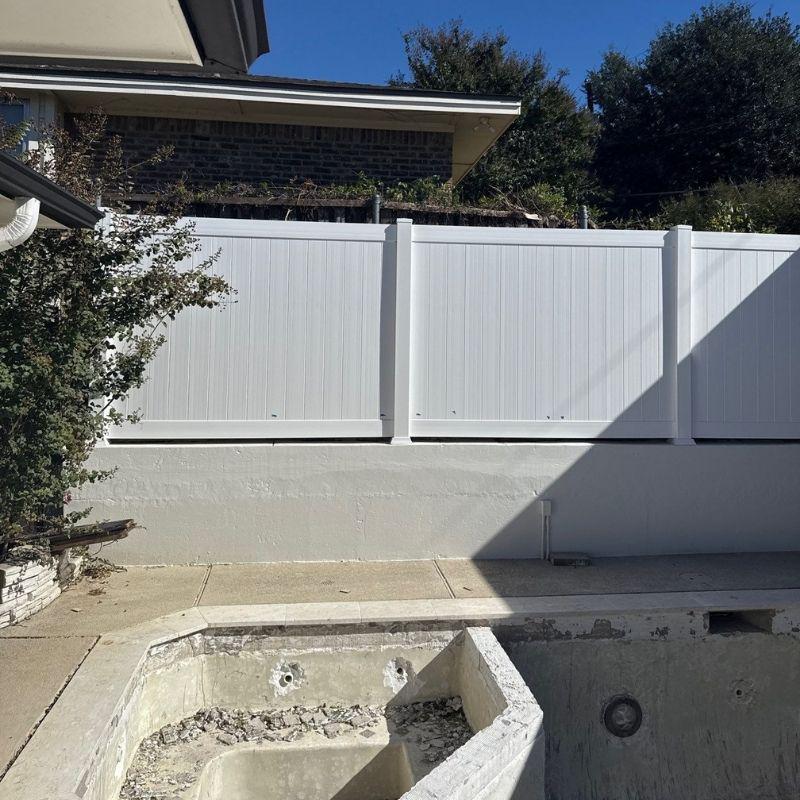 privacy fence installed by top rail fence