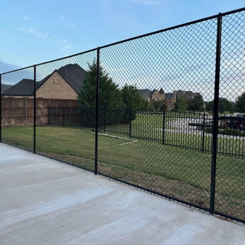 chain link fence installed by top rail fence