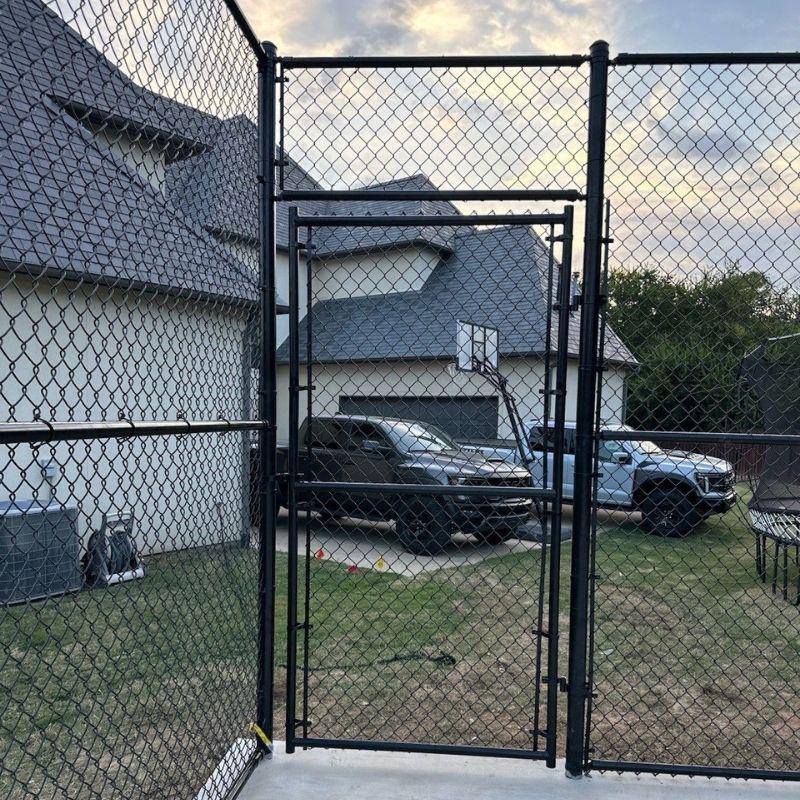 chain link fence installed by top rail fence