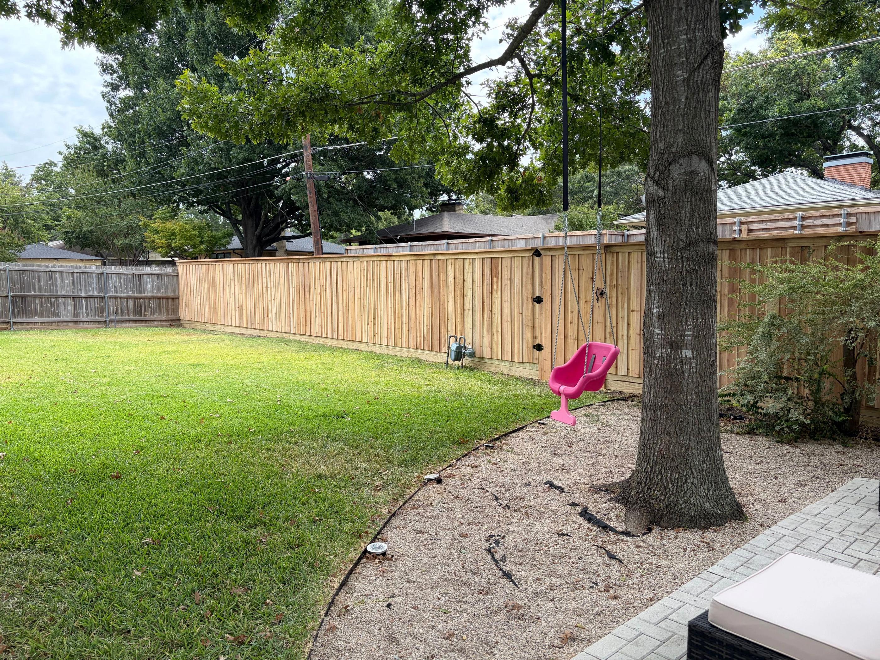cedar board on board fence installed by top rail fence