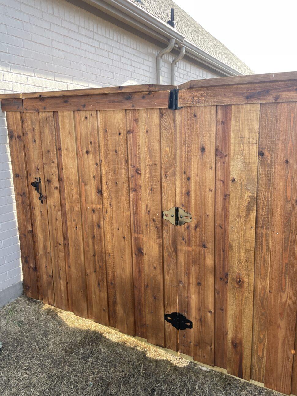 wood board on board fence installed by top rail fence