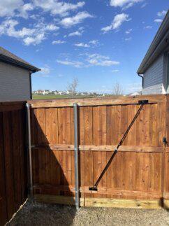 Privacy Fence Installation with 6' Wooden Gates