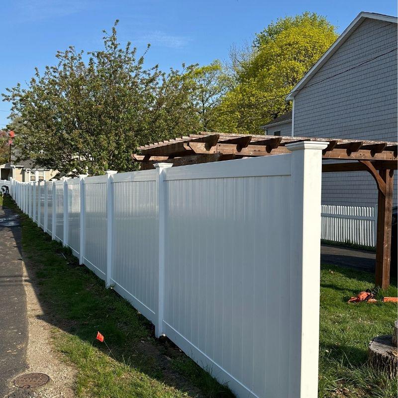 White Vinyl Privacy Fence Installation