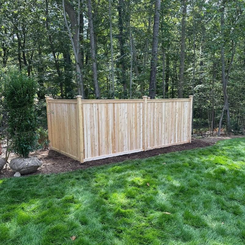 Cedar and Vinyl Fences to Conceal Pool and HVAC Equipment