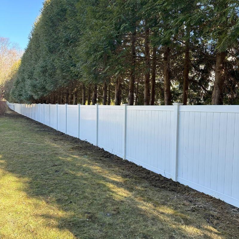 White Vinyl Privacy Fence Installation