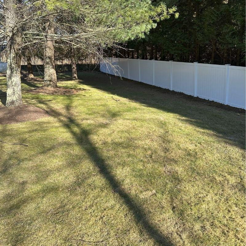 white vinyl fence installed by Top Rail Fence