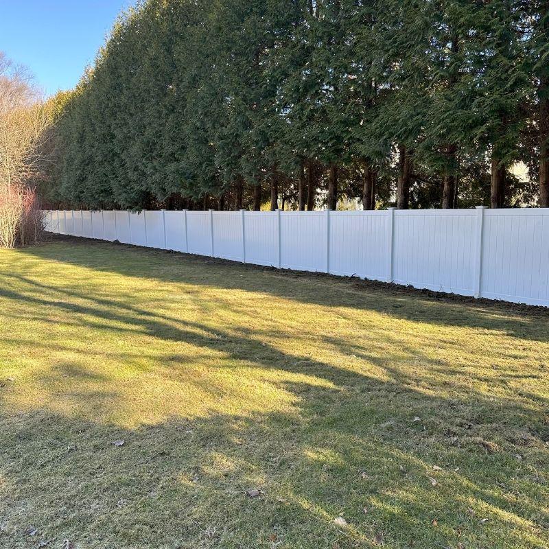 white vinyl fence installed by Top Rail Fence
