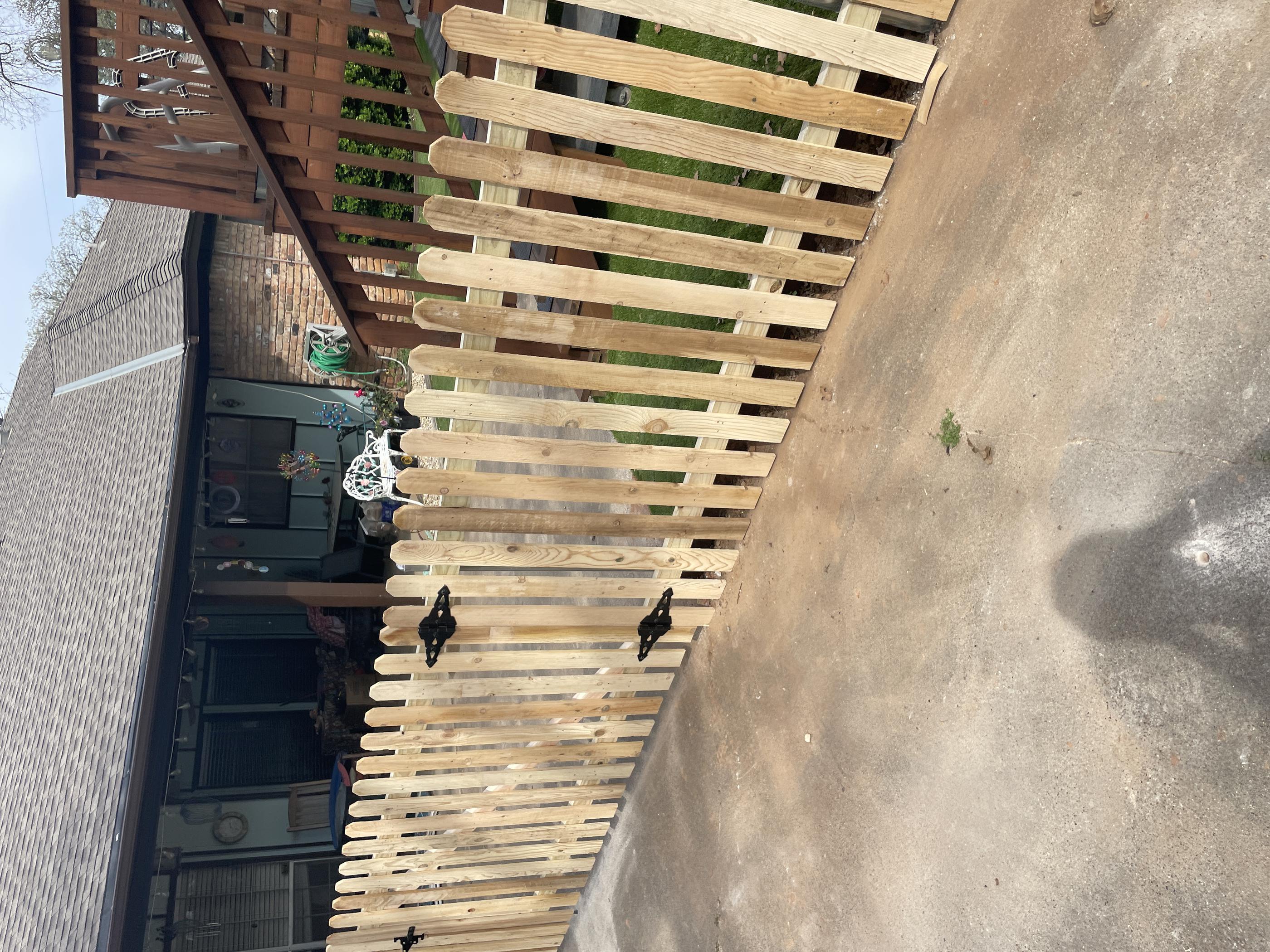 wood picket fence installed by top rail fence