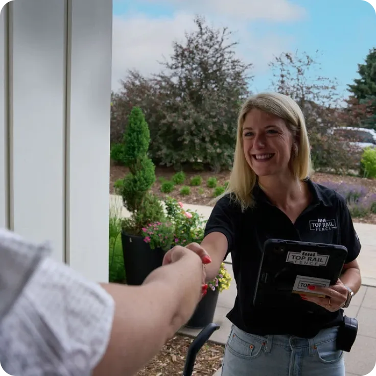 staff shaking hands with customer
