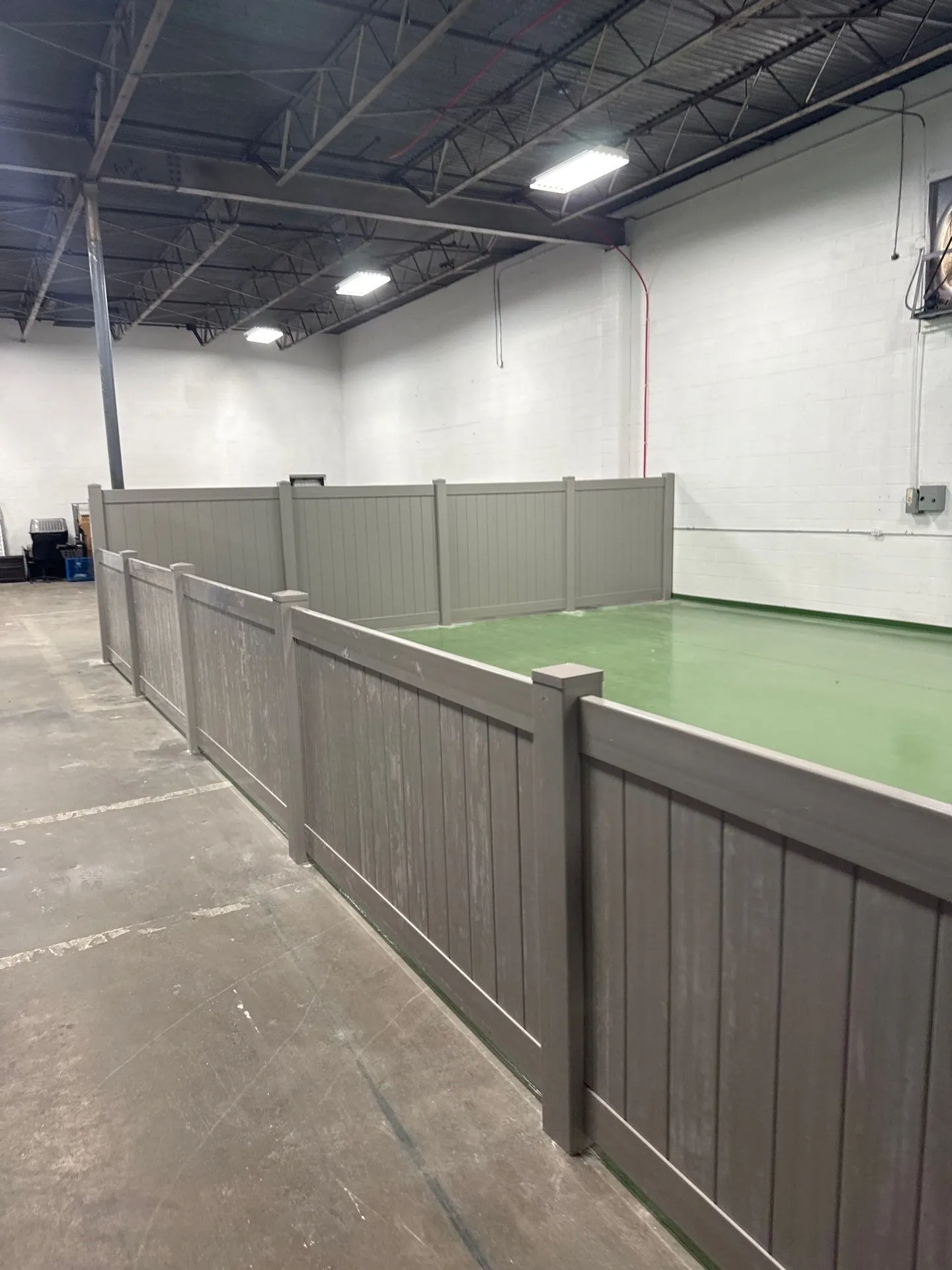 commercial fence installed by top rail fence