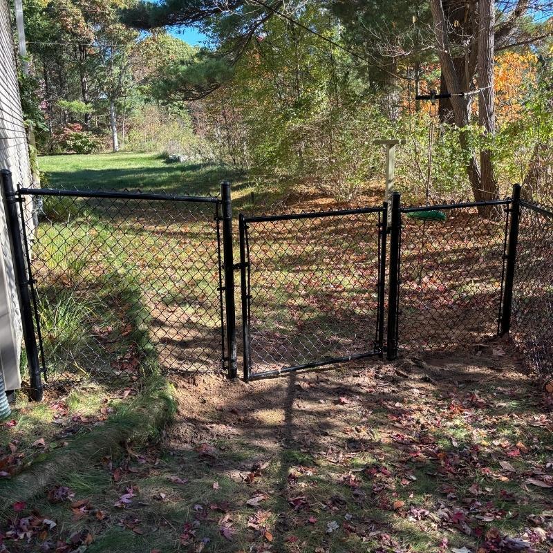 chain link fence installed by top rail fence holland
