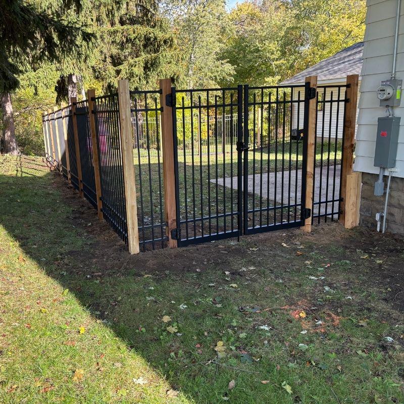 ornamental metal fence installed by top rail fence holland