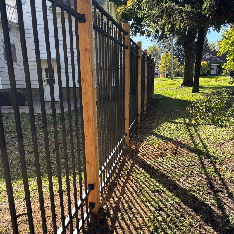 ornamental metal fence installed by top rail fence holland
