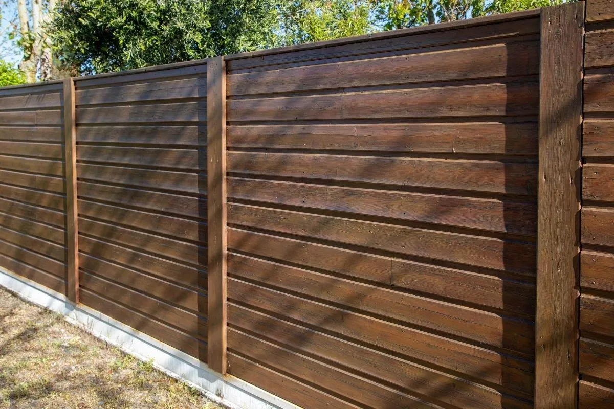 horizontal board wood fence by Top Rail Fence