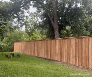 Board on Board fence with cap and trim