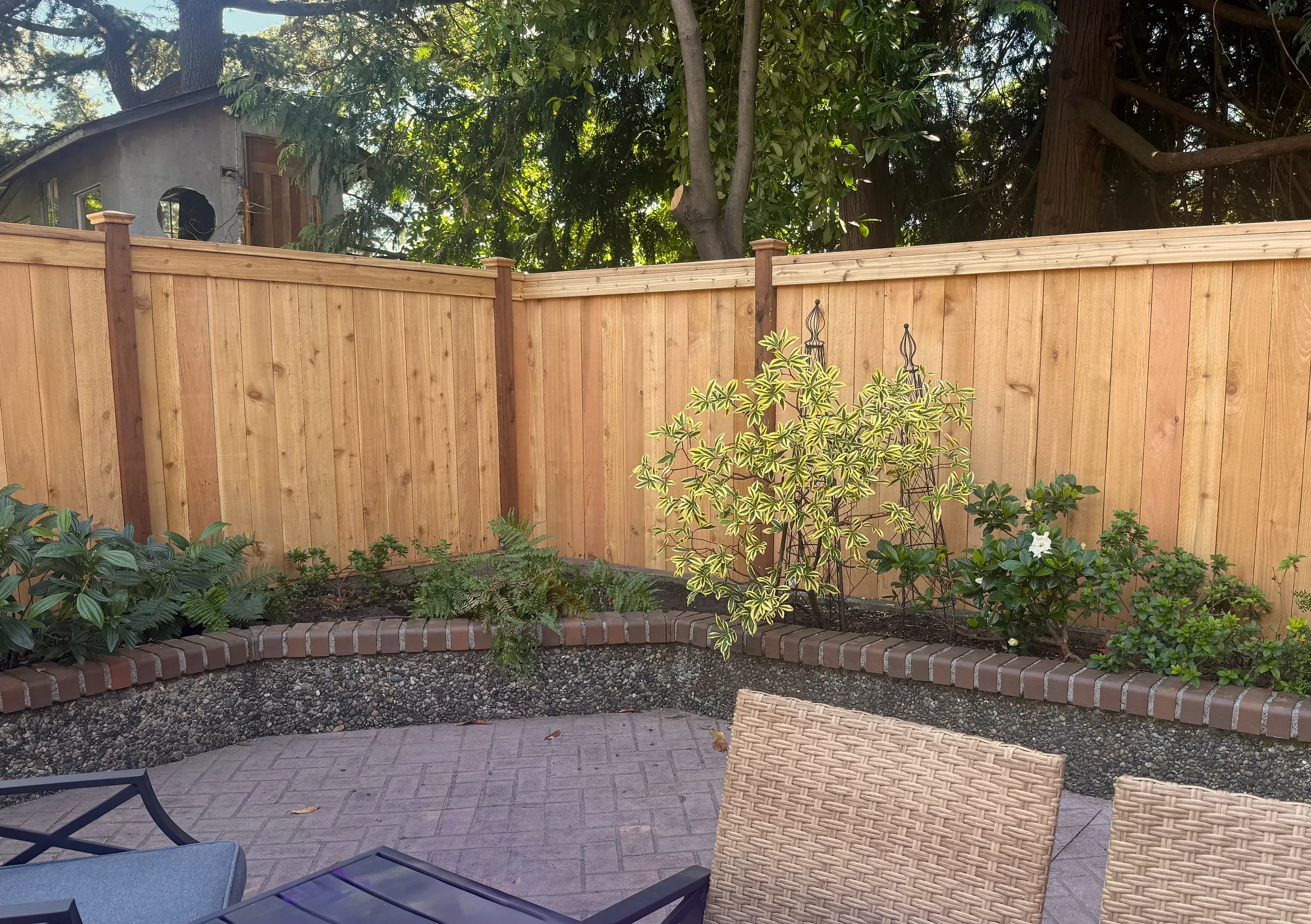 wood cap and trim fence installed by top rail fence