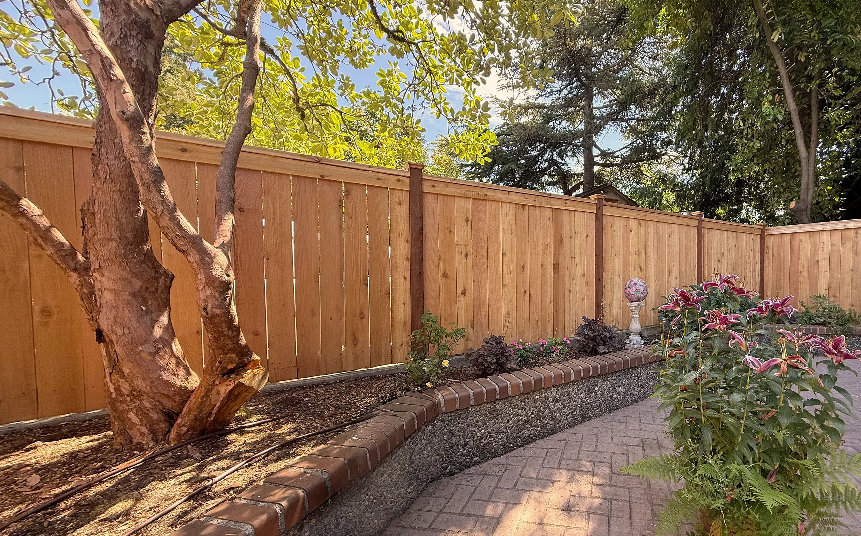 wood cap and trim fence installed by top rail fence