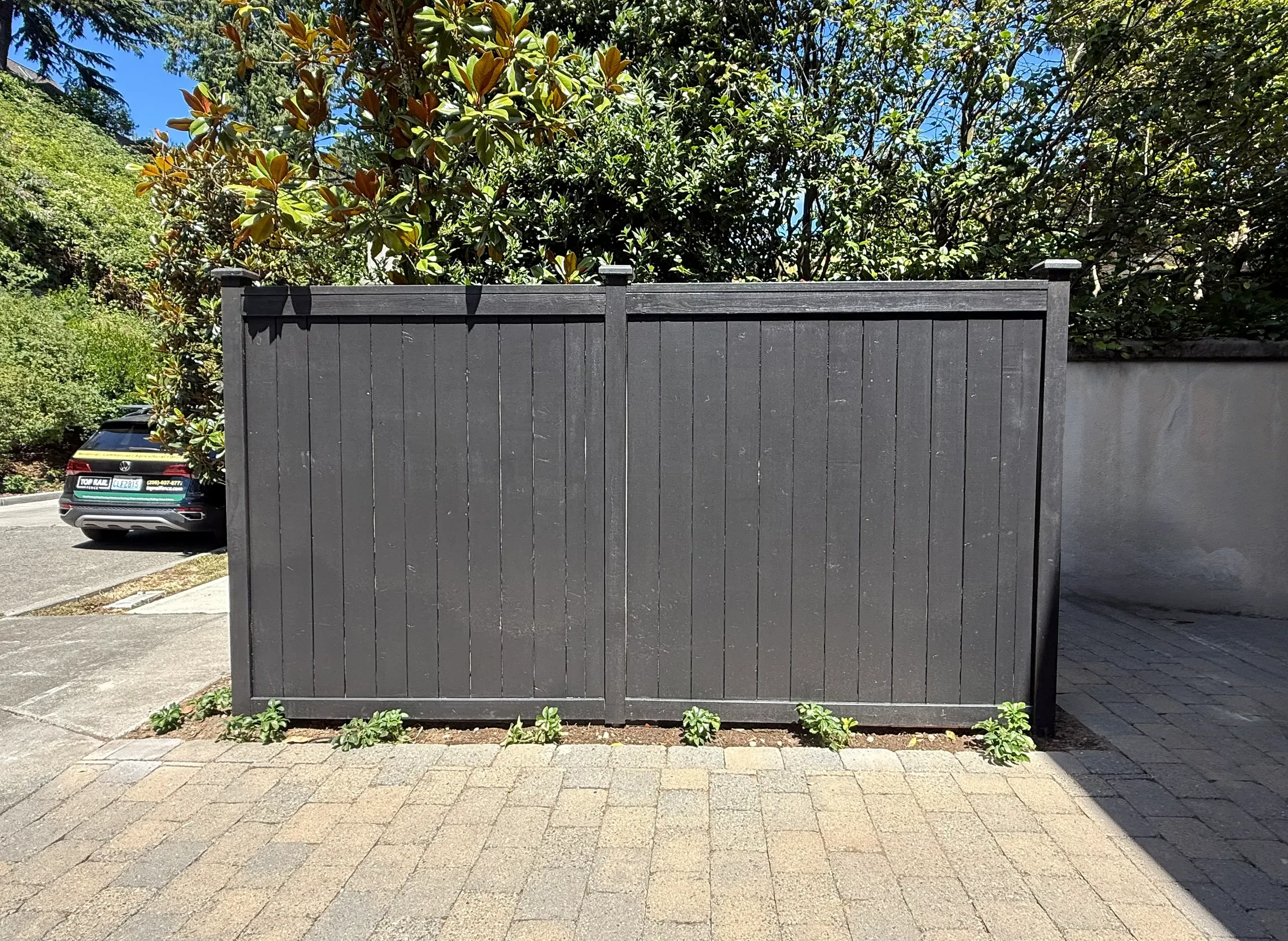wood cap and trim fence installed by top rail fence