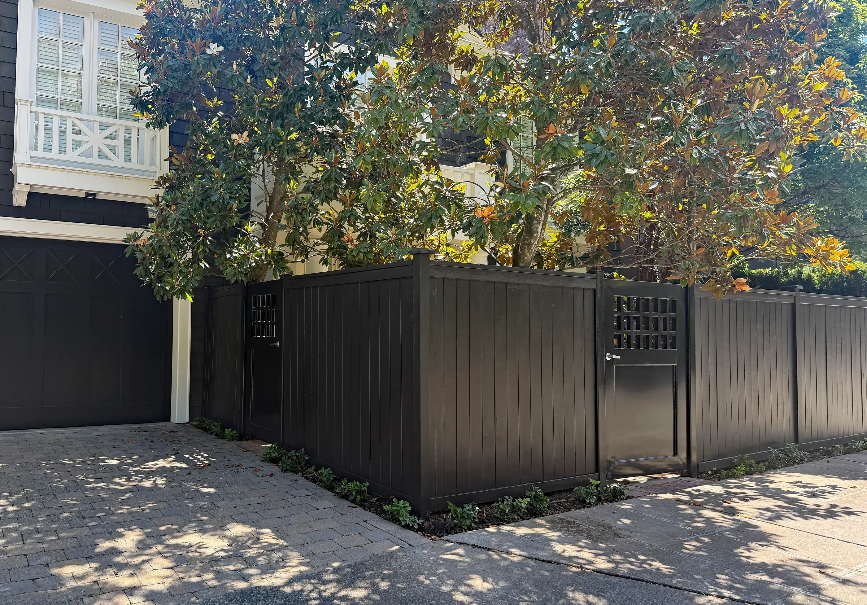 wood cap and trim fence installed by top rail fence