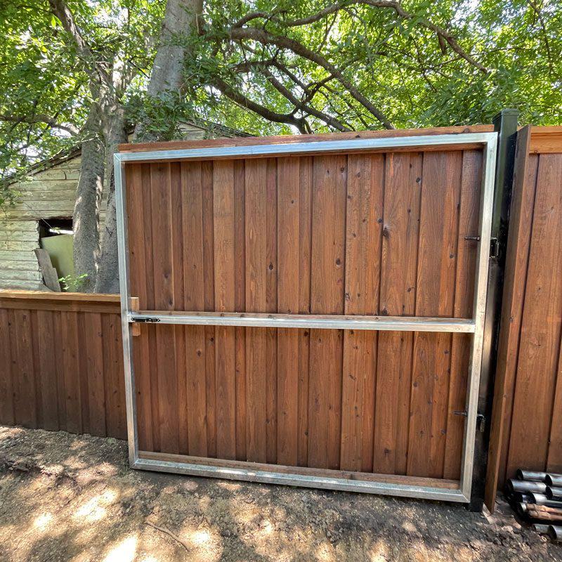 Steel-Post Wood Privacy Fence and Gate