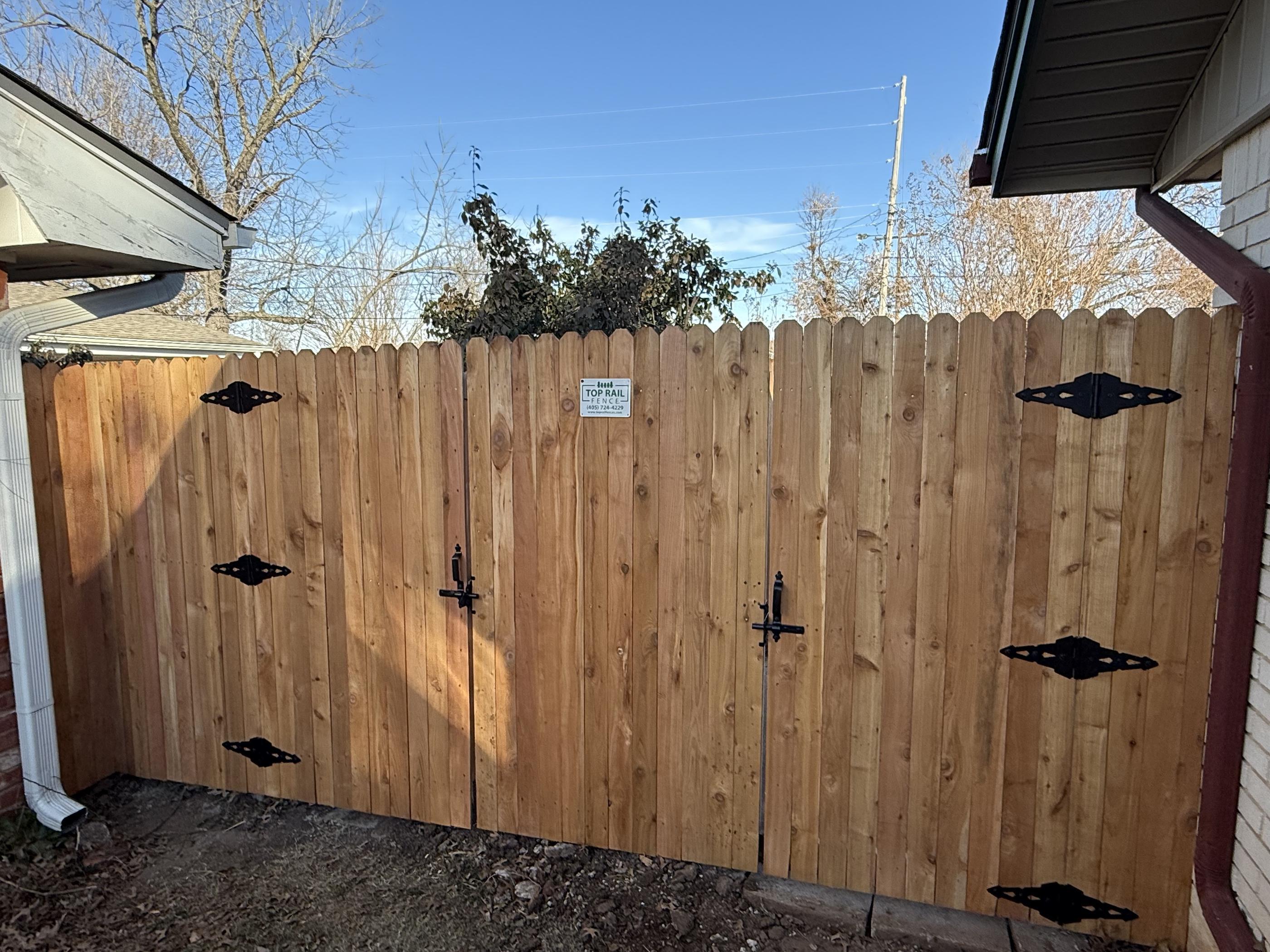 wood stockade fence installed by top rail fence oklahoma city