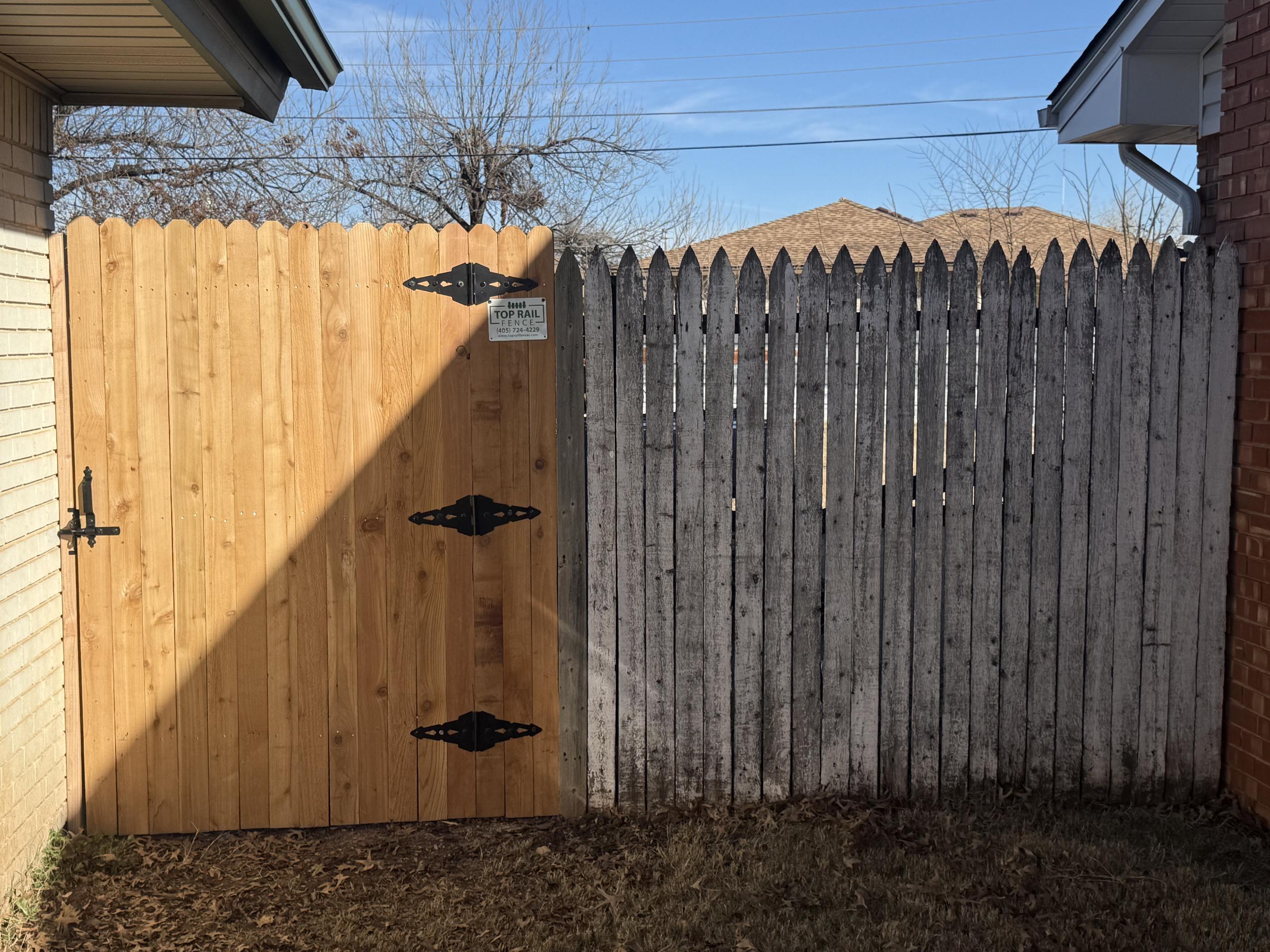 wood stockade fence installed by top rail fence oklahoma city