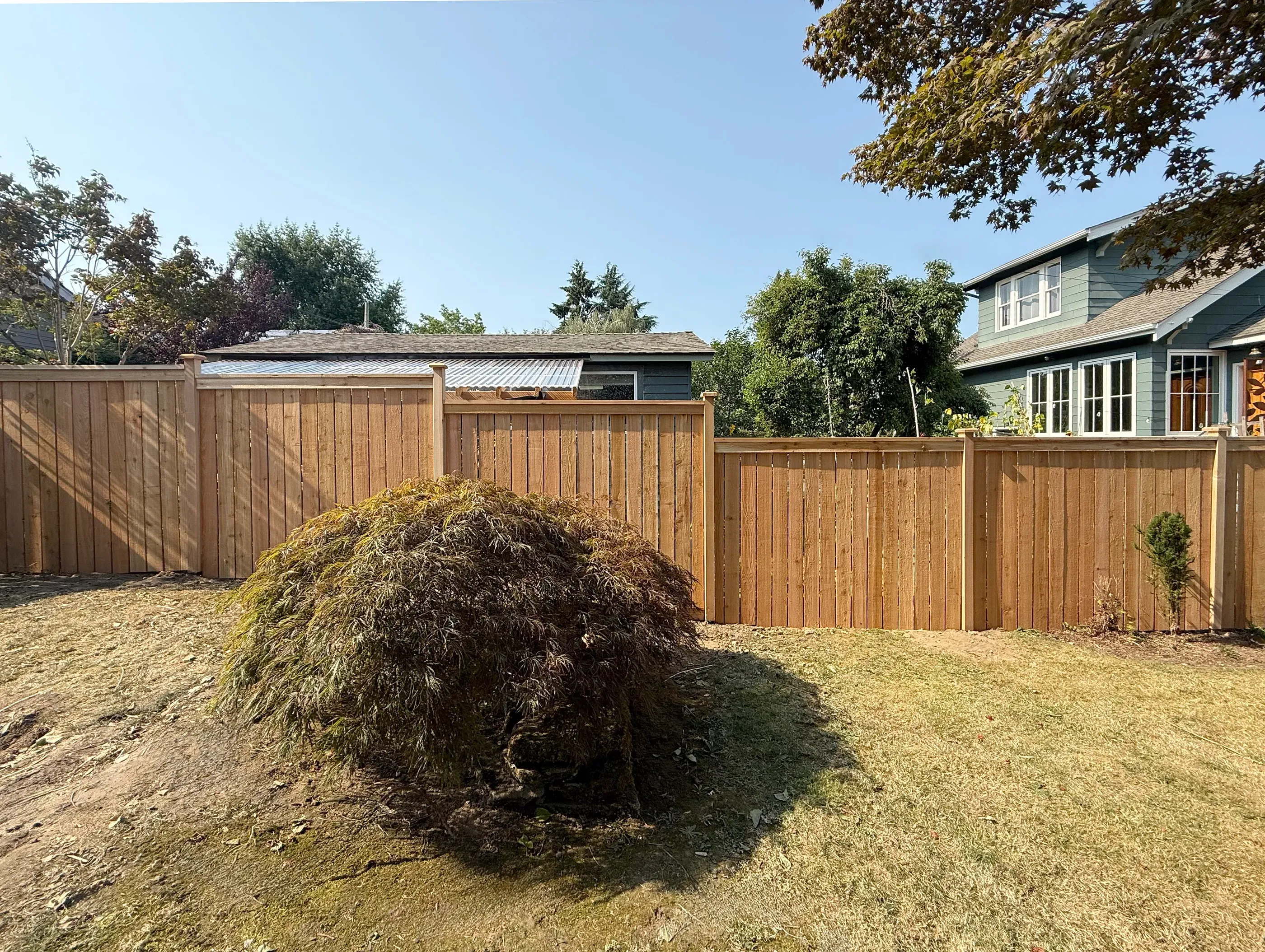 wood cap and trim fence installed by top rail fence