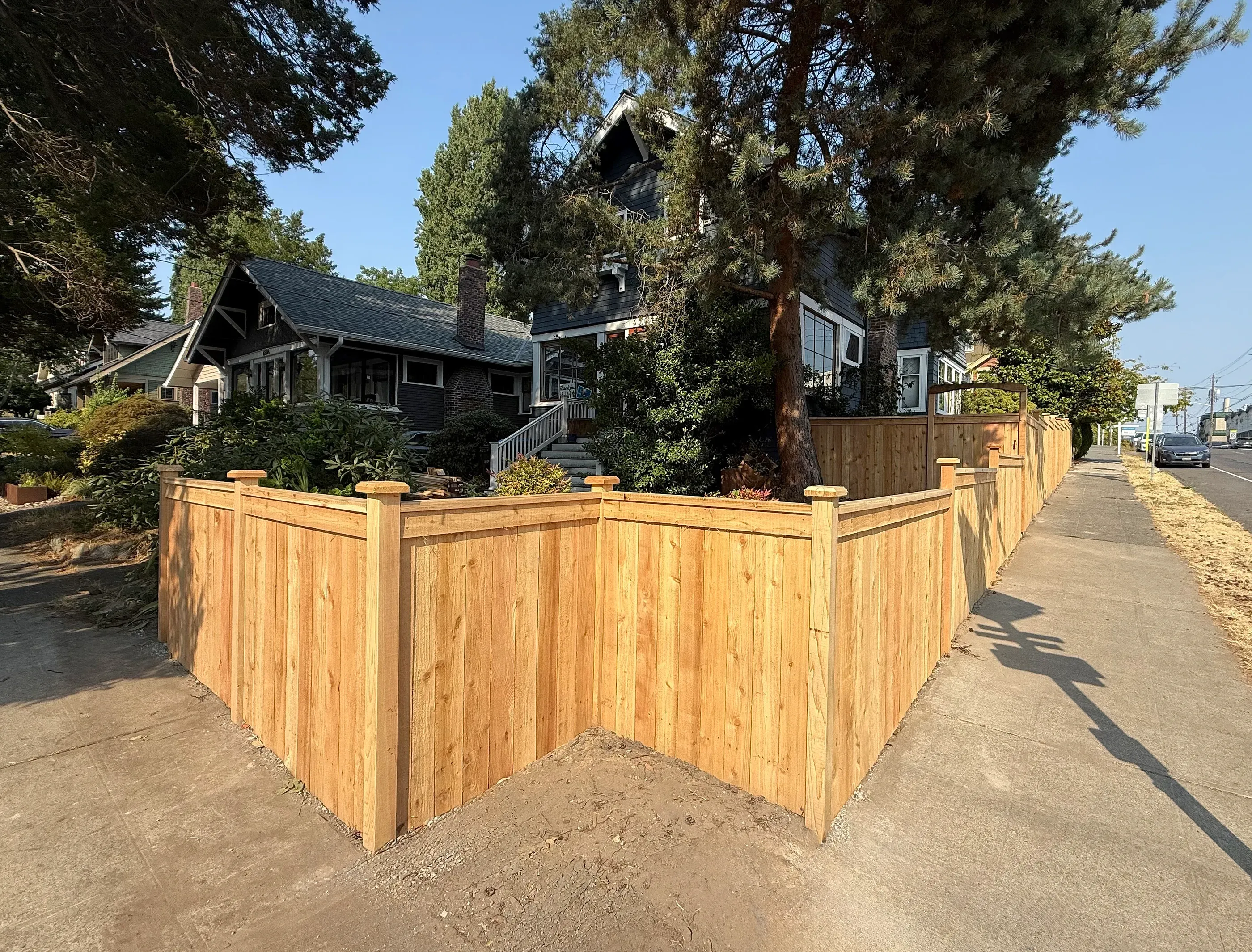 wood cap and trim fence installed by top rail fence