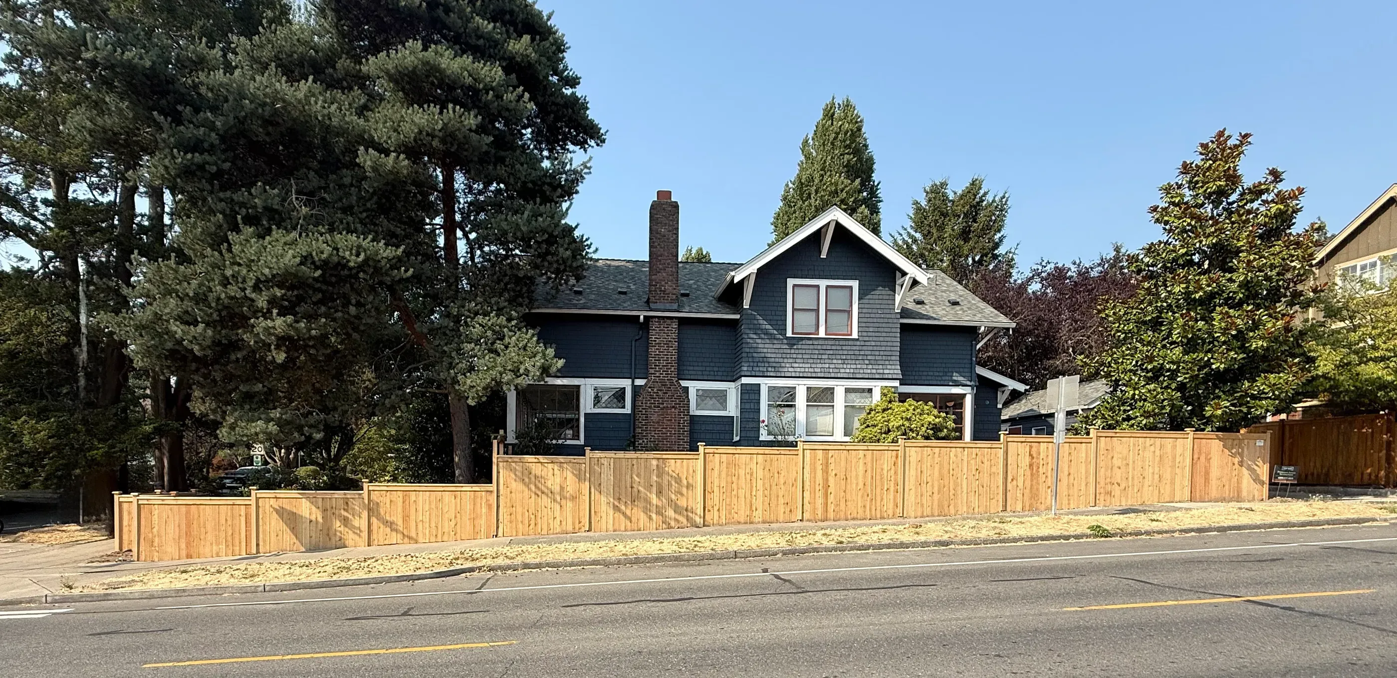 wood cap and trim fence installed by top rail fence