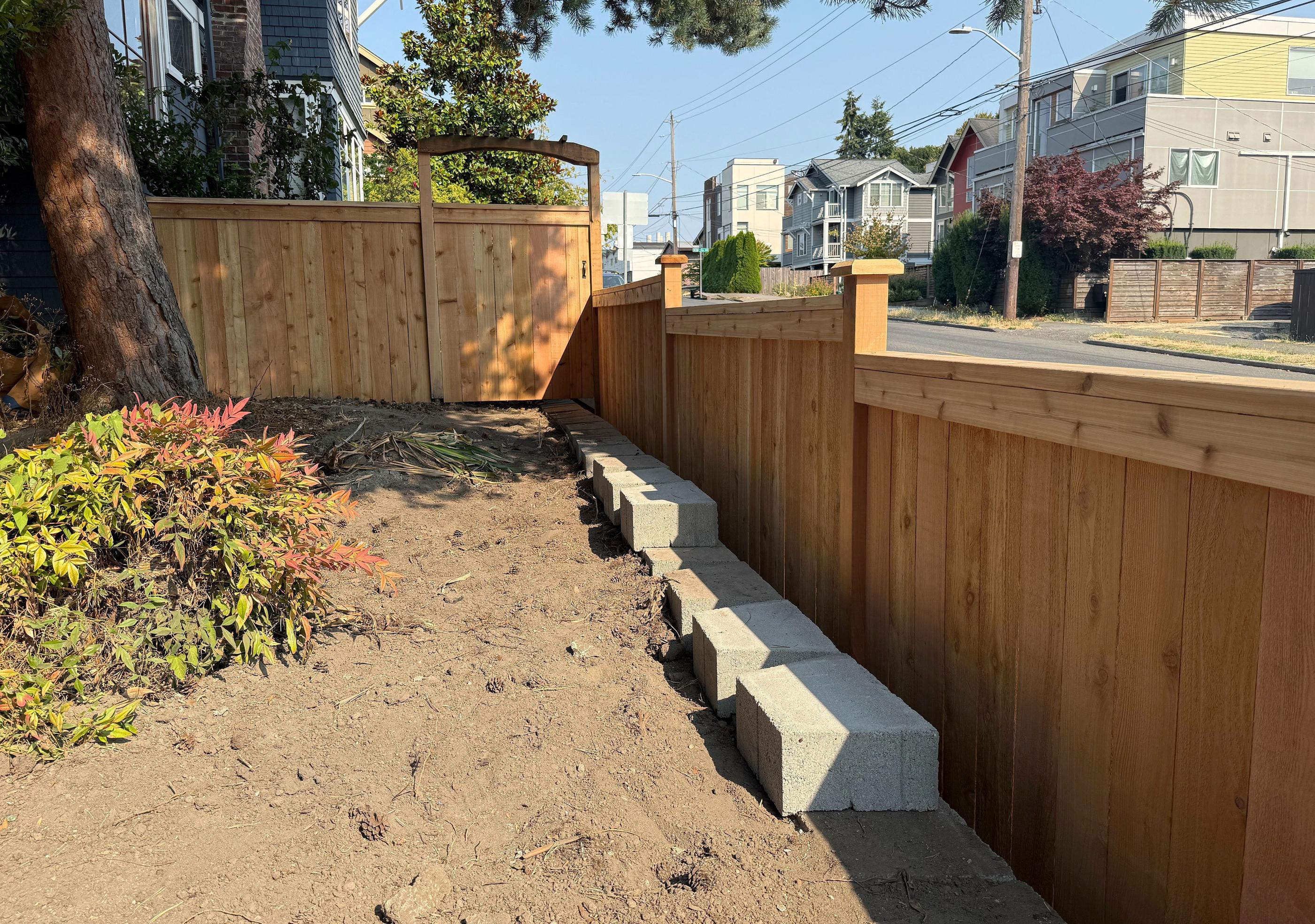 wood cap and trim fence installed by top rail fence