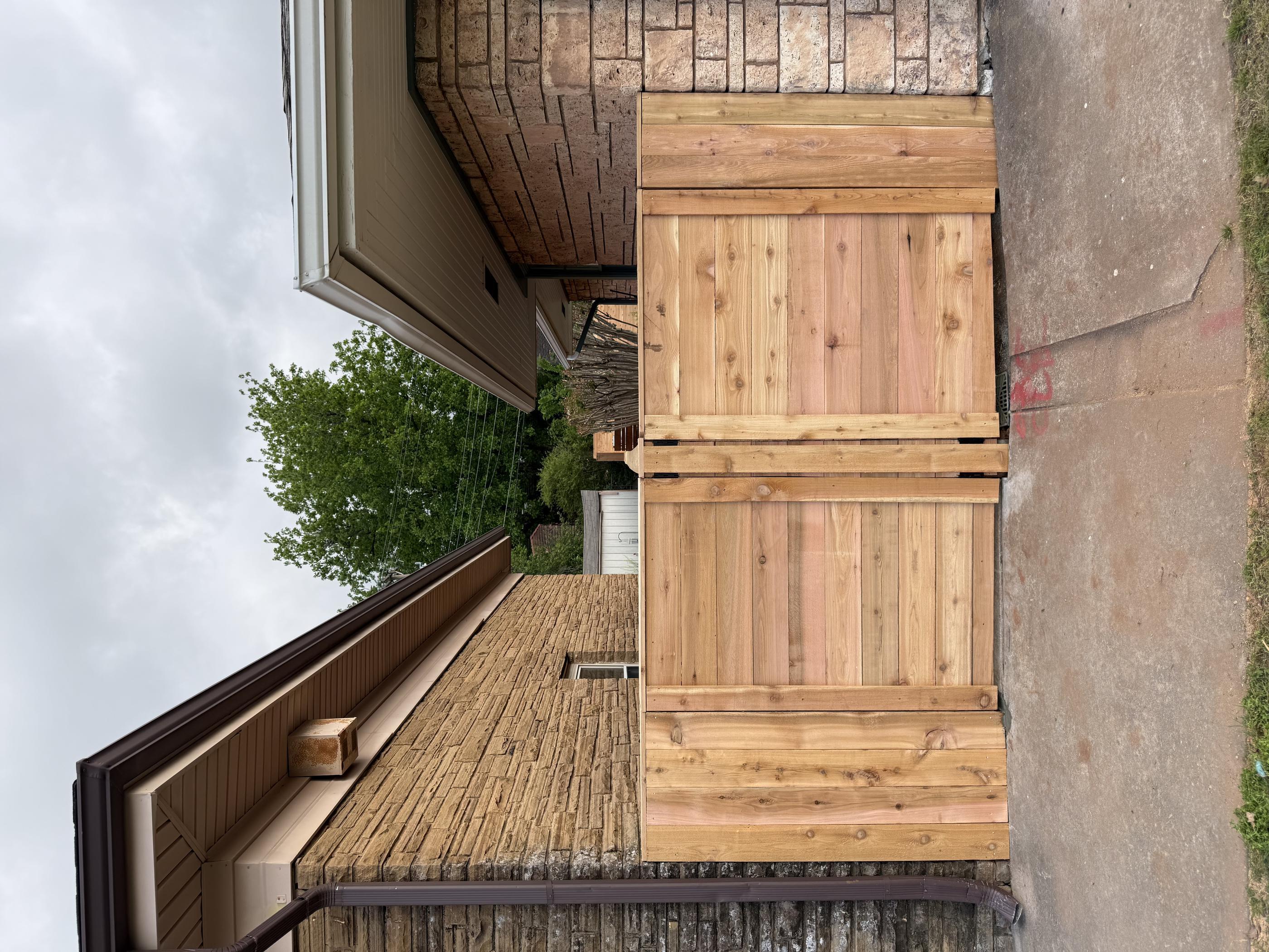 horizontal wood fence installed by top rail fence