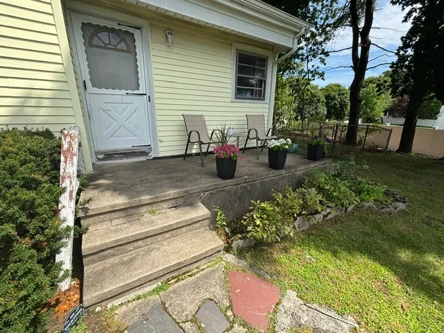 Front porch of a home without a fence