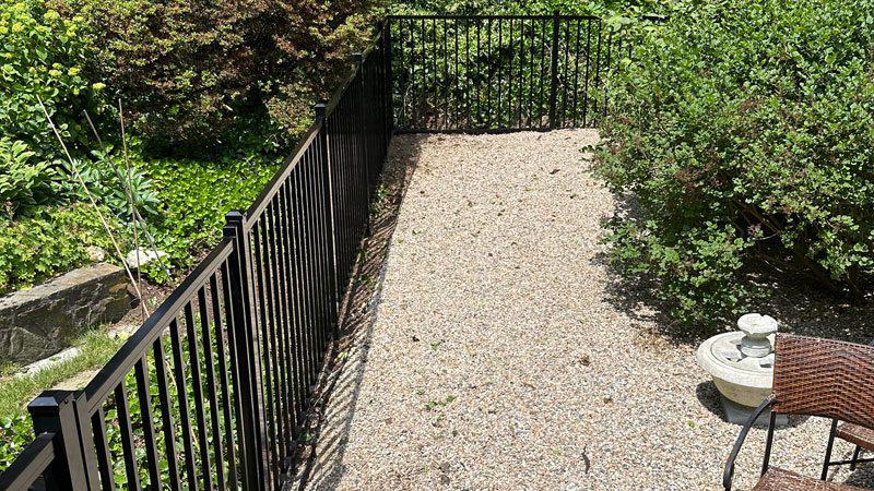 Aluminum fence installation to keep the dogs safe!