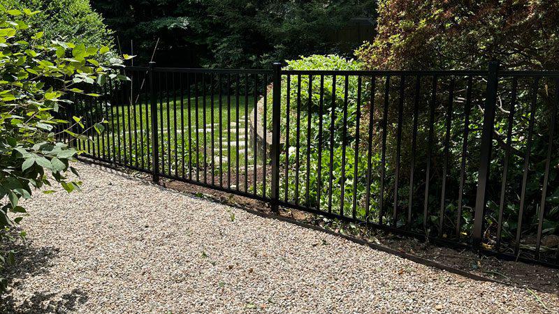 Aluminum fence installation to keep the dogs safe!