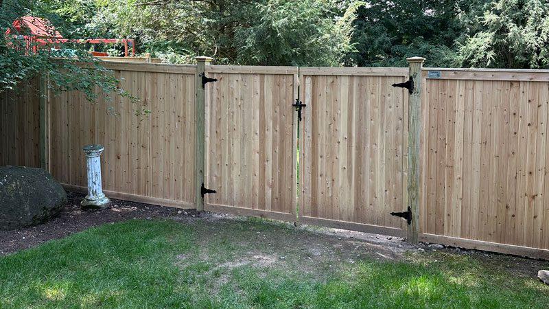 Custom cedar wood fence installation