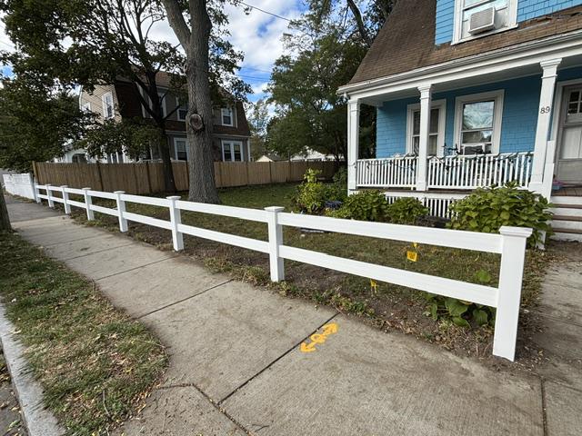vinyl ranch rail fence installed by top rail fence