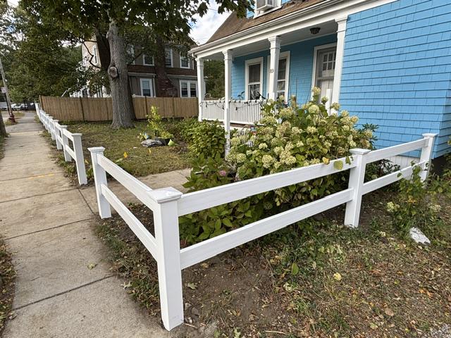 vinyl ranch rail fence installed by top rail fence