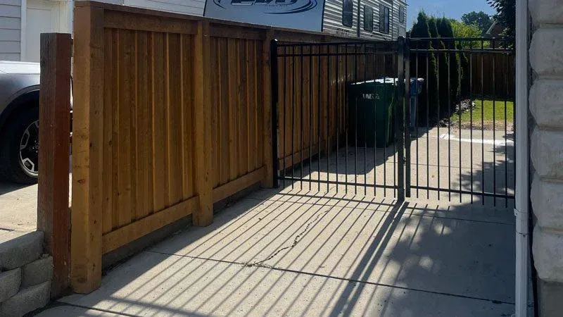 Wood Board on Board Fence in Backyard 