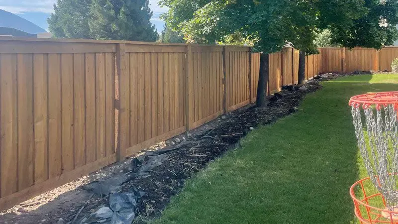 wood board on board fence installed by top rail fence