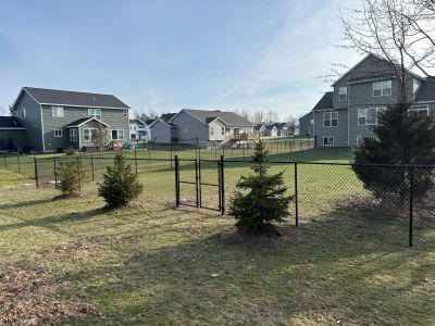 Black Chain Link Fence installed in an HOA in Holland, MI